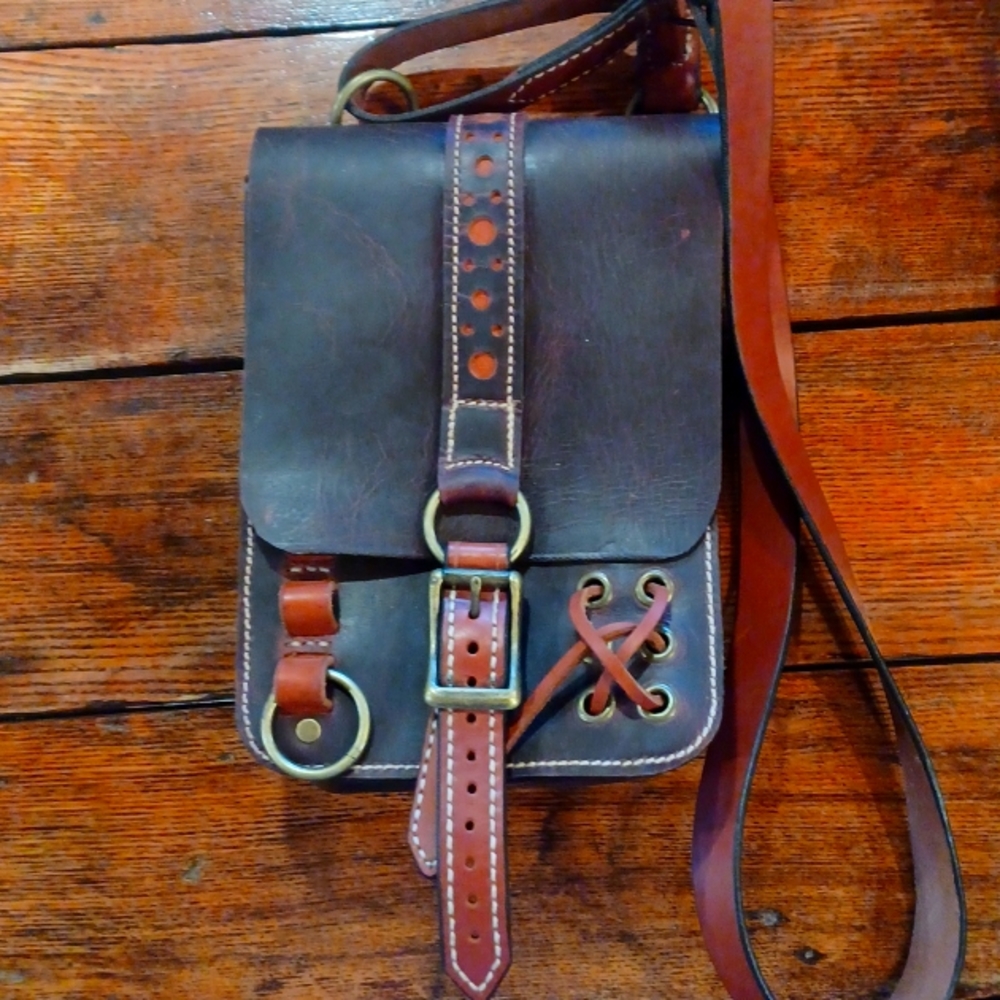Hand crafted one of a kind all leather stachel.